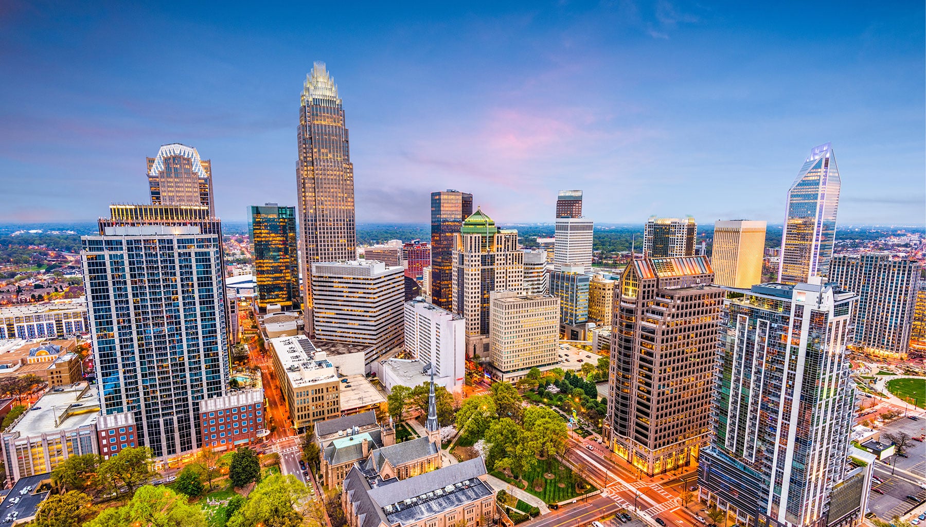 Downtown Charlotte, NC, with blue sky and vibrant colors